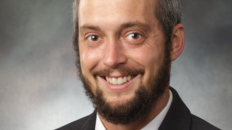 ERIC MITCHELL SCHUMANN